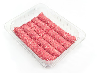 Raw kebab minced meat in plastic bowl isolated on white