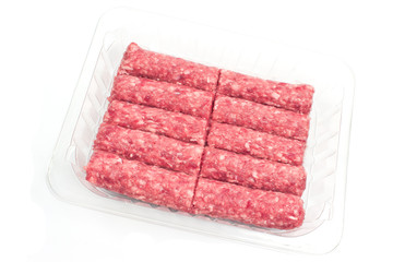 Raw kebab minced meat in plastic bowl isolated on white