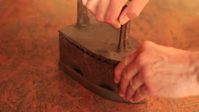 Opening an old rusty iron
