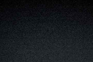 Static noise from an old analog tv screen in the darkness. Real footage, real moirè.
