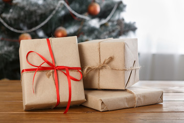 Christmas present on decorated room background, holiday concept