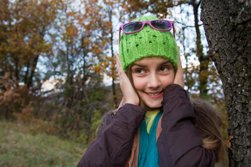 Fototapeta na wymiar Young girl posing in nature