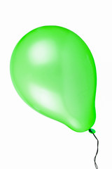 Flying green balloon isolated on white background