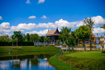 Obraz premium Traditional Thai house style with blue sky in thailand ancient simulation park kanchanaburi. Photo taken on: 12 November 2016