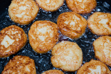 cheese cakes fried in a pan