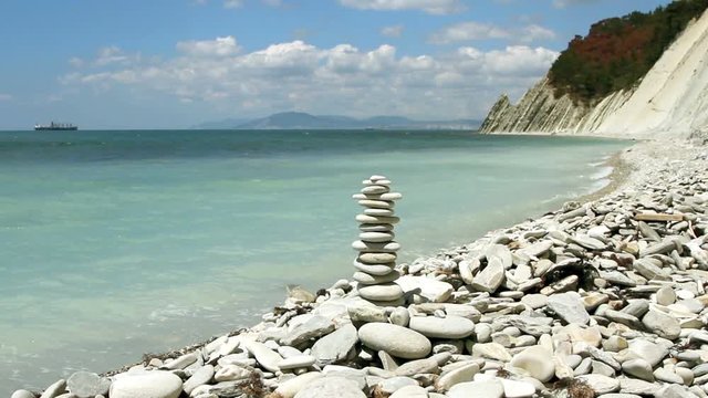 stack of zen stones on the beach