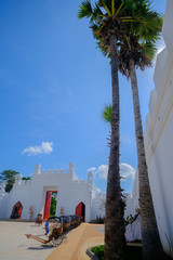 Gates to the Old City Thai fortification with blue sky in thailand ancient simulation park...