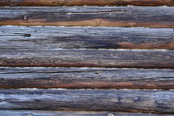 Obraz premium Vintage Natural Weathered Old Log Cabin Wall Facade Background T