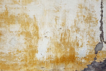 Old Limewash  Yellow Plaster Wall With Cracked Surface Backgroun