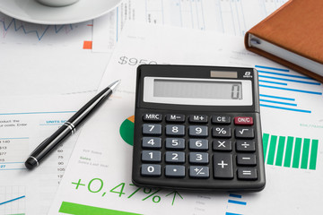 Calculator and pen