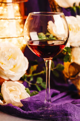 Glass of wine on vintage background