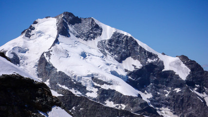 Fototapeta na wymiar Piz Bernina and the famous Bianco Ridge in the Swiss Alps