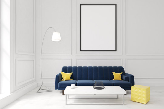 Living Room With Poster, Dark Blue Sofa And A Coffee Table