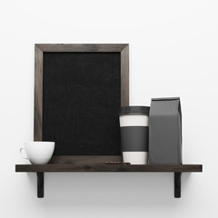 Black poster and coffee cups on white wall