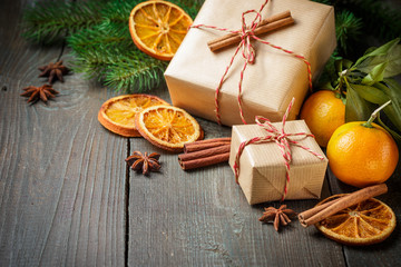 Christmas decoration with gift box and mandarines