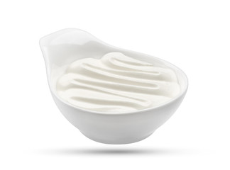 Sour cream in bowl isolated on white background