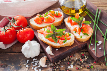 sandwiches with tomatoes on a board, selective focus