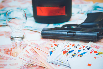 The gun and playing cards Russian big money