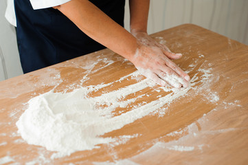 Chef preparing dough - cooking process