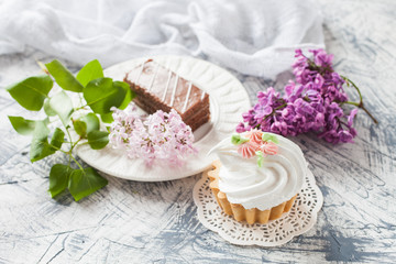 Fototapeta na wymiar cream cakes on a table, selective focus