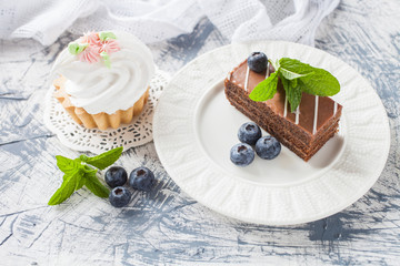 cream cakes on a table, selective focus