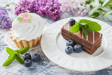 cream cakes on a table, selective focus