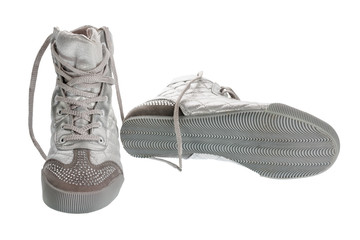 Silver sports gym shoes in rhinestones, isolated