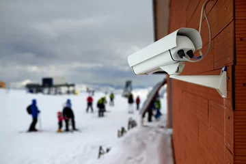 Fototapete surveillance camera in mountains ski resort © Аrtranq