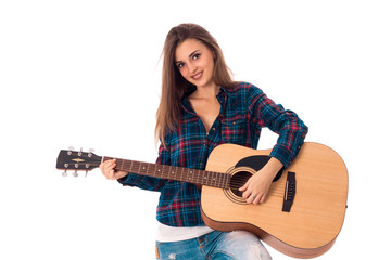 glamour brunette girl playing guitar