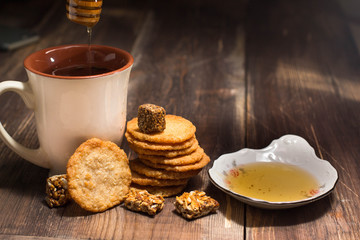   herbal hot tea, cookies, honey and sweets