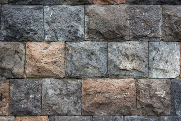 Stone wall of worked stone. Natural background.