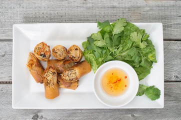 Vietnamese vegetarian egg rolls, cha gio chay on wooden backgrou