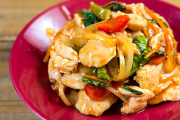 wok fried chicken stir fry with sweet peppers and chinese vegeta