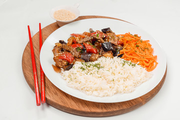 Meat with rice and carrots