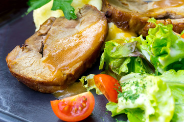 pork chop-delicious juicy pork chop with mash potatoes in black