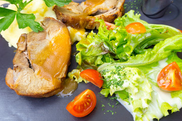 pork chop-delicious juicy pork chop with mash potatoes in black