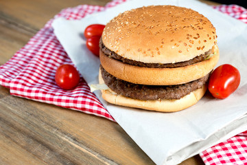 delicious American cheese burger with tomato