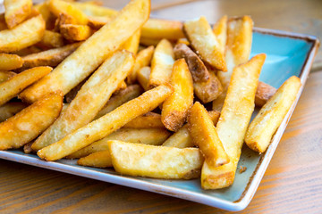 Golden French fries potatoes ready to be eaten