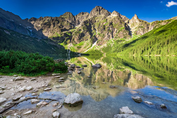 Fototapeta na wymiar Beautiful sunrise at lake in the Tatra Mountains in Poland