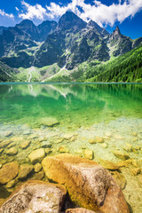 Stunning lake in the mountains at dawn in summer - obrazy, fototapety, plakaty