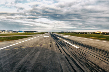 Airplane runway. Detail of runway with pattern of wheels