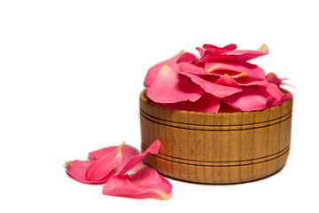 petals of roses in the wooden bowl