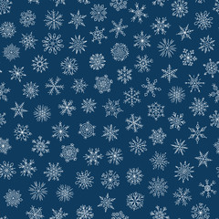 Christmas seamless doodle pattern with snowflakes