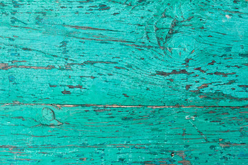 Fototapeta na wymiar Background from boards painted in turquoise color