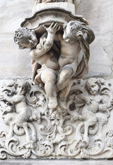 architectural detail. stone sculptures of two angels