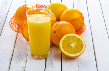 fresh orange juice wooden rustic background
