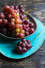 Organic grape on rustic background