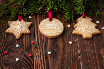 Fototapeta na wymiar Christmas cookies on the wooden background