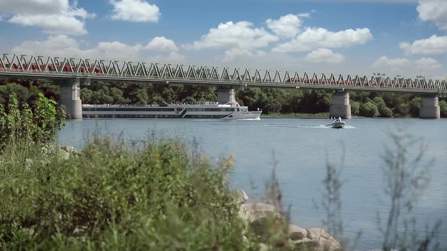 Two Trains Crossing The Bridge At The Same Time, Tourist Ship On The River
