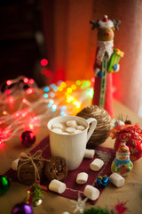 Homemade chocolate cookies with cup of cocoa and marshmallow. Christmas hot drink with tasty cookies.